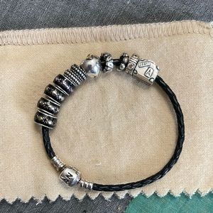 Pandora black leather bracelet with charms & clips